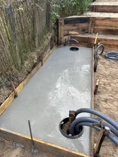 Création d'une dalle béton pour la réalisation d'un cabanon de piscine en volige couvre joints à la Teste de Buch, Bassin d'Arcachon, AN TERRASSEMENT